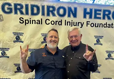 Chris Doelle with Mack Brown